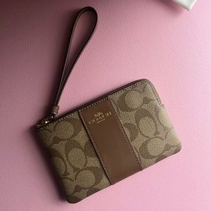 Coach Corner Zip Wristlet In Signature Canvas
